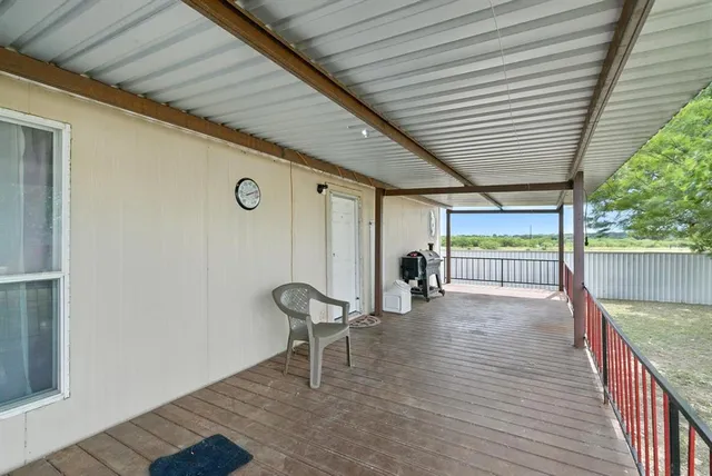 a view of parking garage with cars
