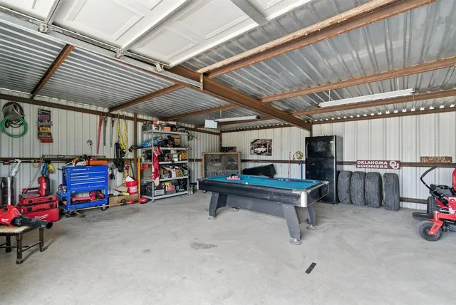 a view of a backyard with fence