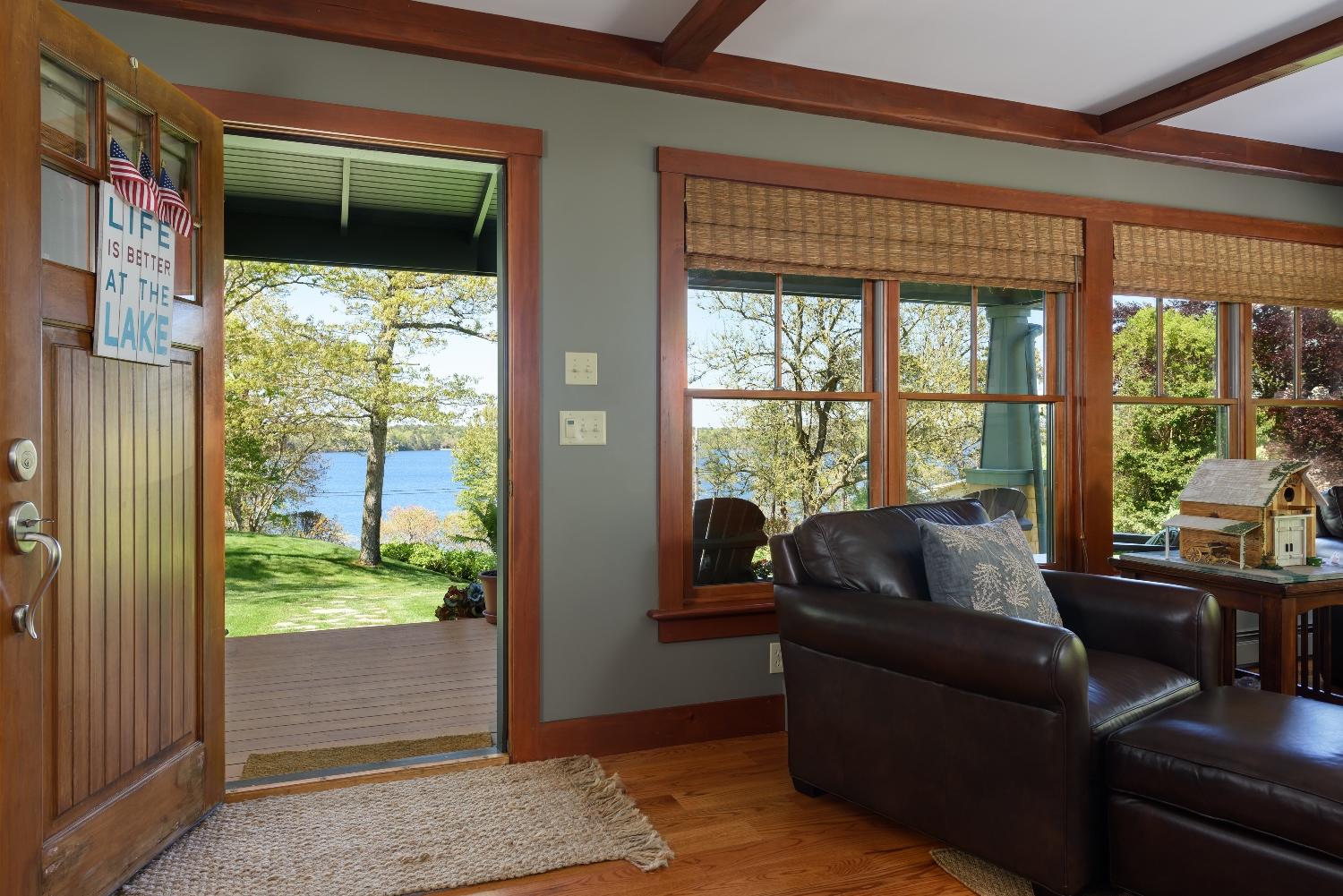 51 Sequattom Road Harwich, MA 02645 - Photo 11 of 35 a living room with furniture and a large window