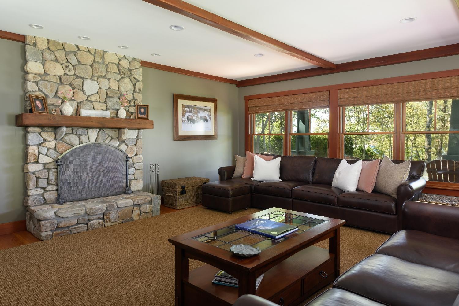 51 Sequattom Road Harwich, MA 02645 - Photo 13 of 35 a living room with furniture a fireplace and a large window