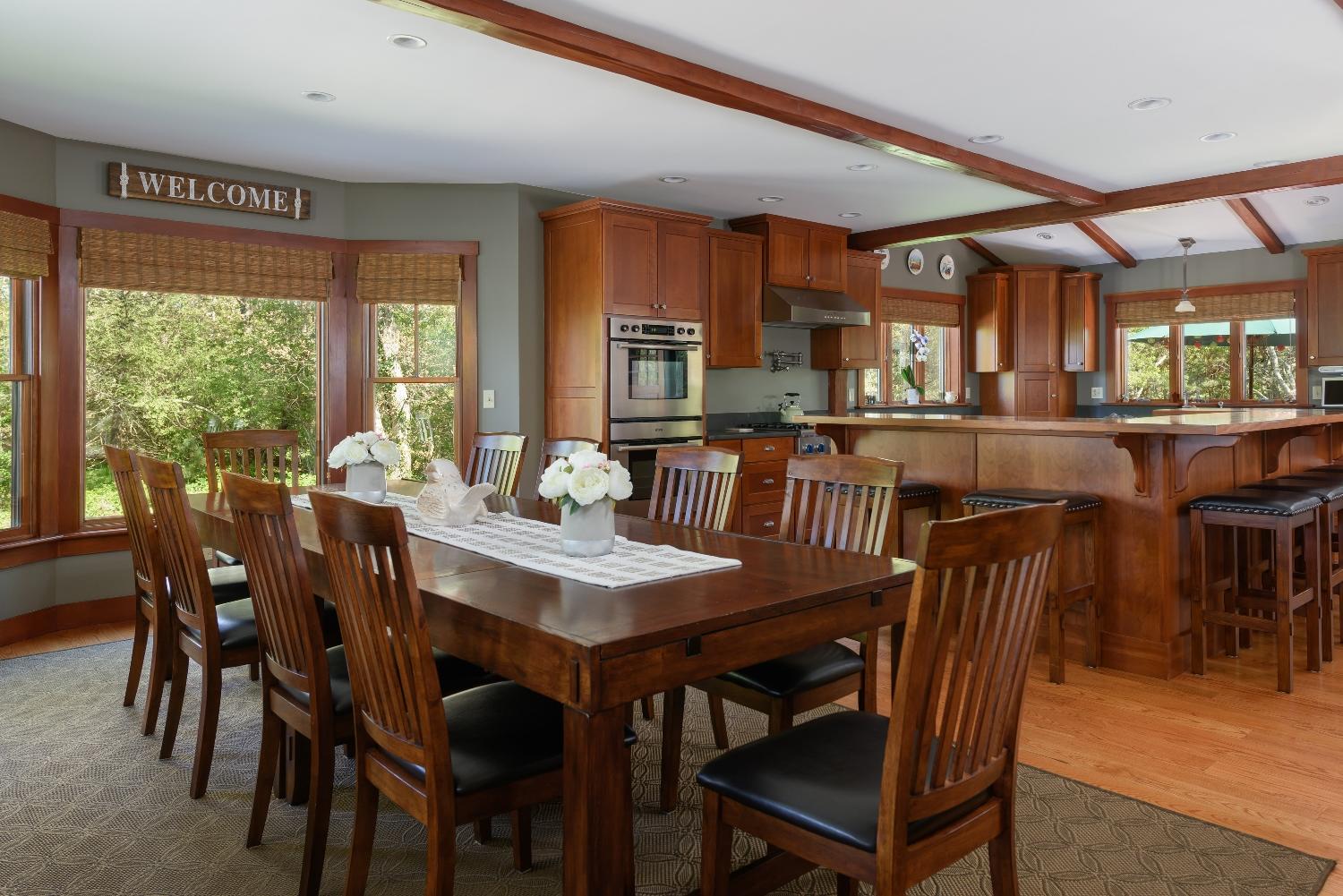 51 Sequattom Road Harwich, MA 02645 - Photo 14 of 35 a view of a dining room with furniture window and outside view