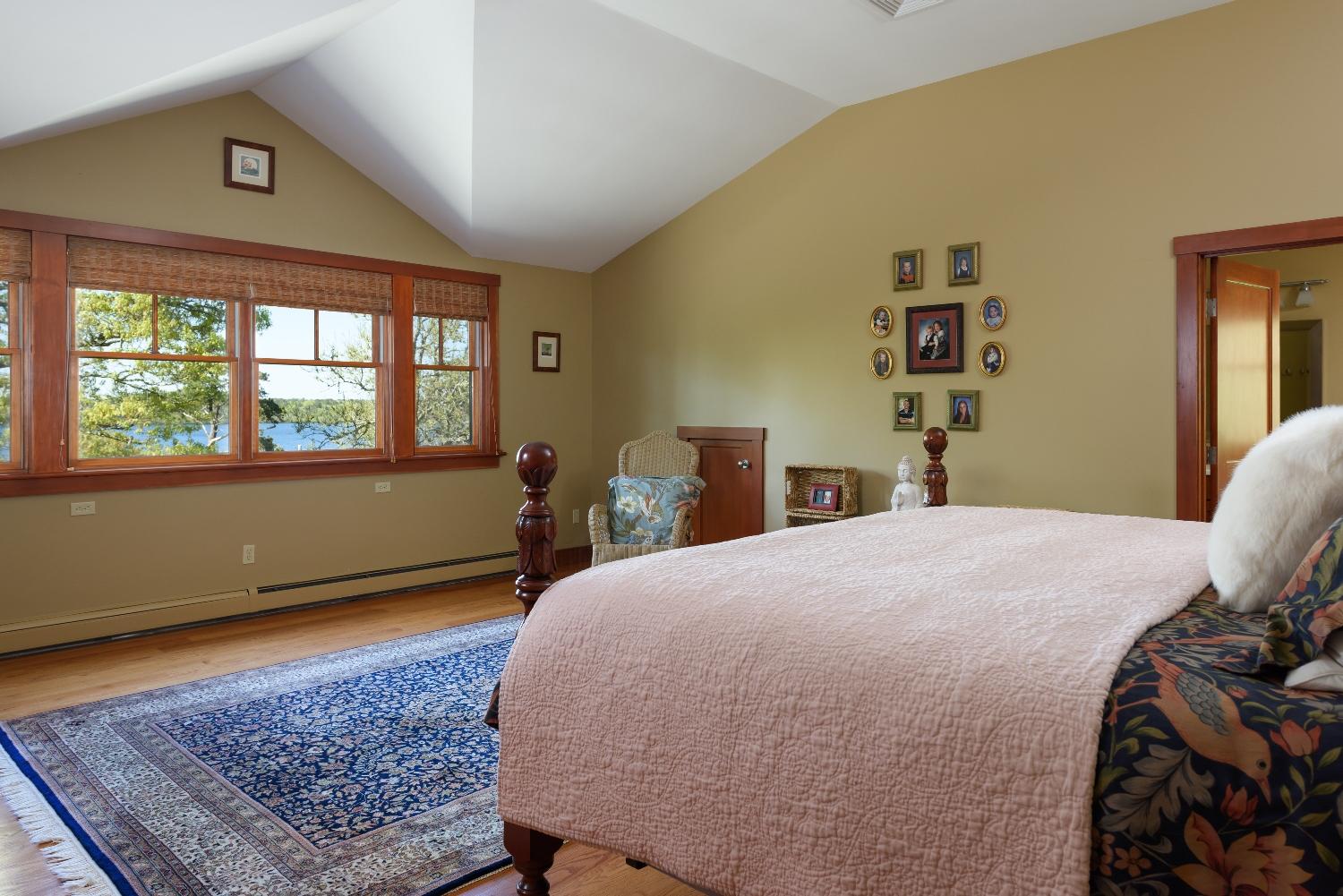 51 Sequattom Road Harwich, MA 02645 - Photo 17 of 35 a bedroom with a bed and wooden floor