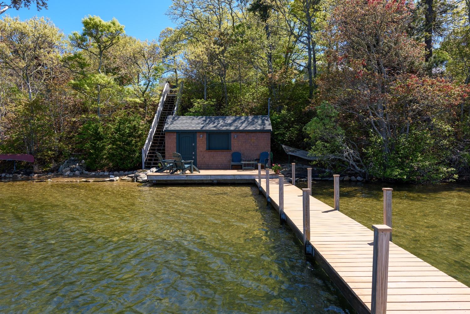 51 Sequattom Road Harwich, MA 02645 - Photo 29 of 35 a view of a house with swimming pool