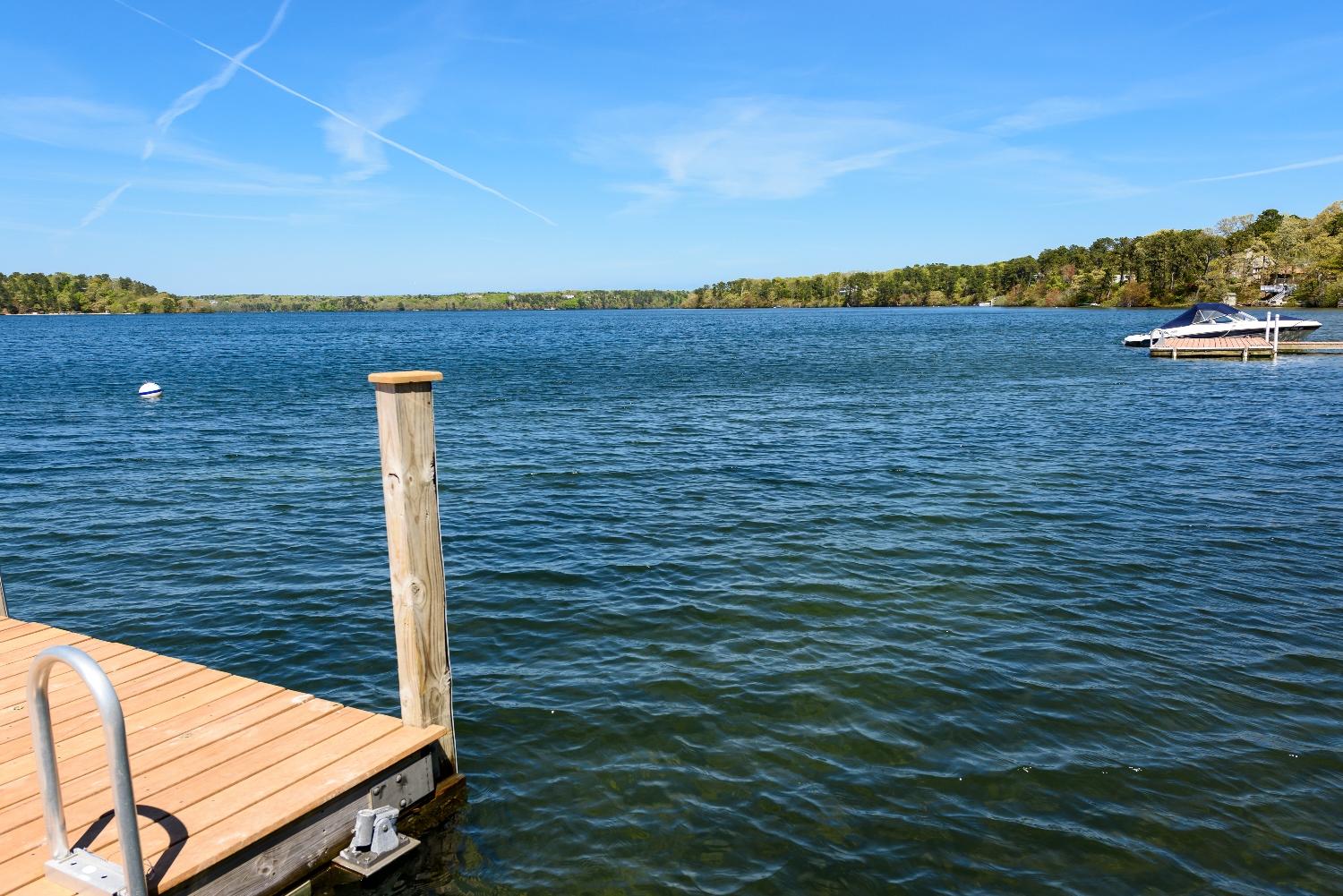 51 Sequattom Road Harwich, MA 02645 - Photo 31 of 35 a view of a lake with a mountain view