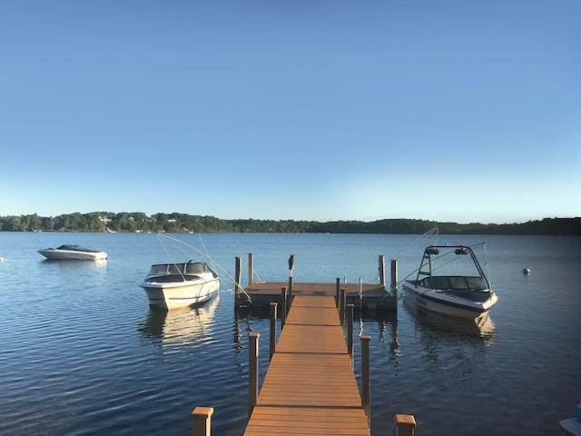 51 Sequattom Road Harwich, MA 02645 - Photo 4 of 35 a view of a lake with outdoor seating