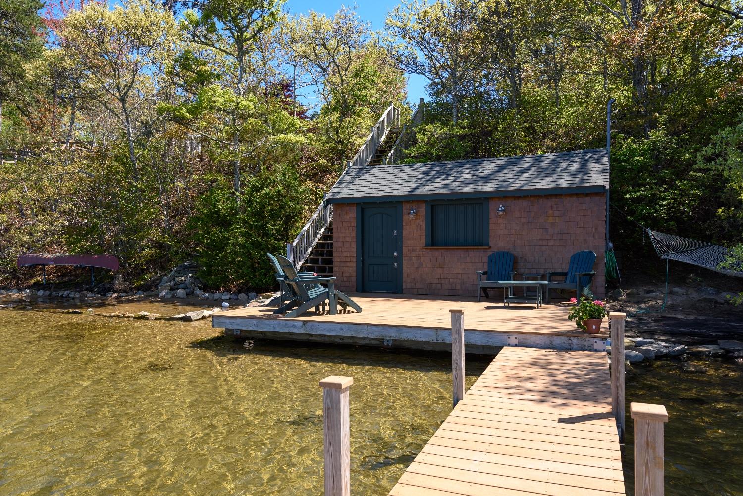 51 Sequattom Road Harwich, MA 02645 - Photo 5 of 35 a view of a house with pool and chairs