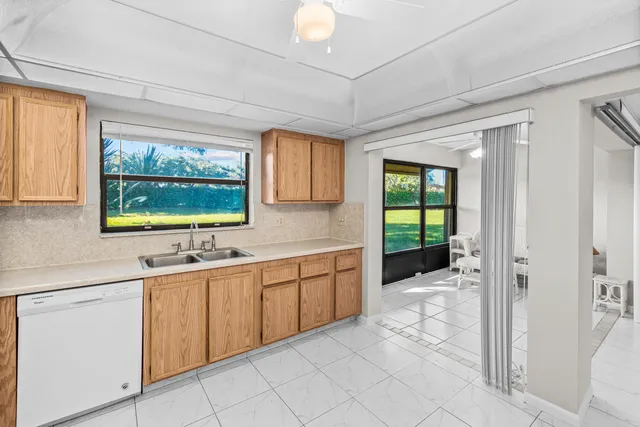 a bedroom with a bed and a television