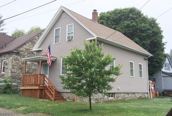 2 Burton Court Worcester, MA 01607 - Photo 2 of 25 a front view of house with a garden