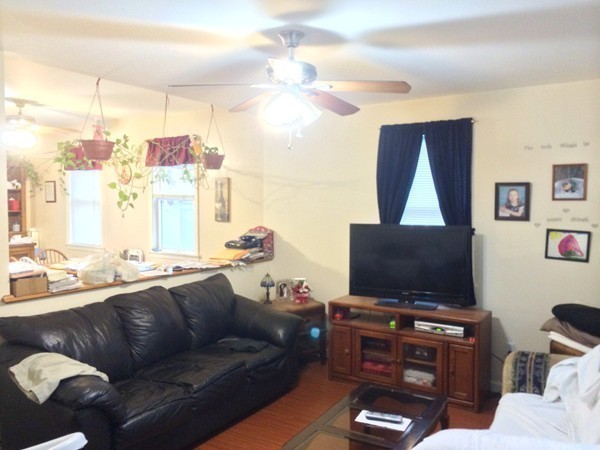 2 Burton Court Worcester, MA 01607 - Photo 7 of 25 a living room with furniture and a flat screen tv