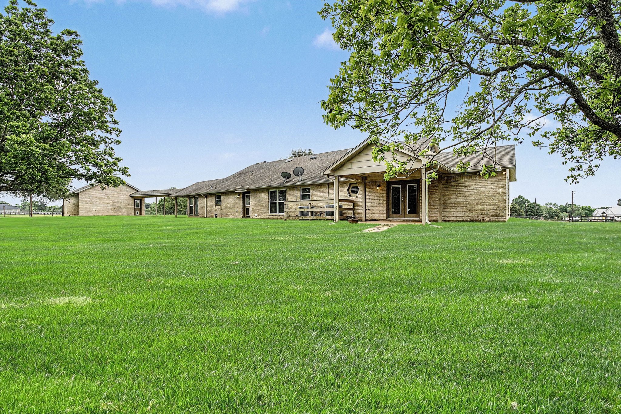 35564 Brumlow Road Hempstead, TX 77445 - Photo 27 of 46 a front view of house with a garden