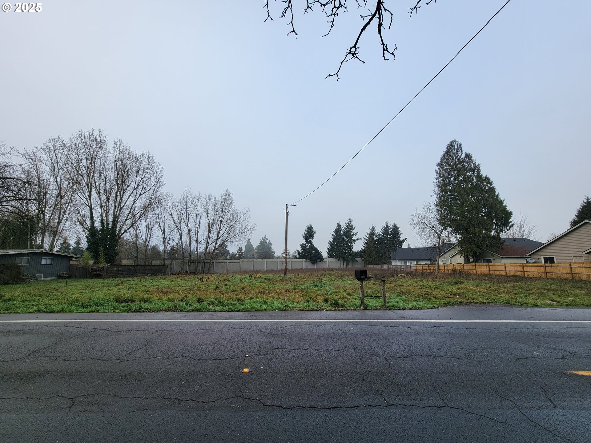 2895 Fisher Road Northeast Salem, OR 97305 - Photo 2 of 5 a view of road and trees