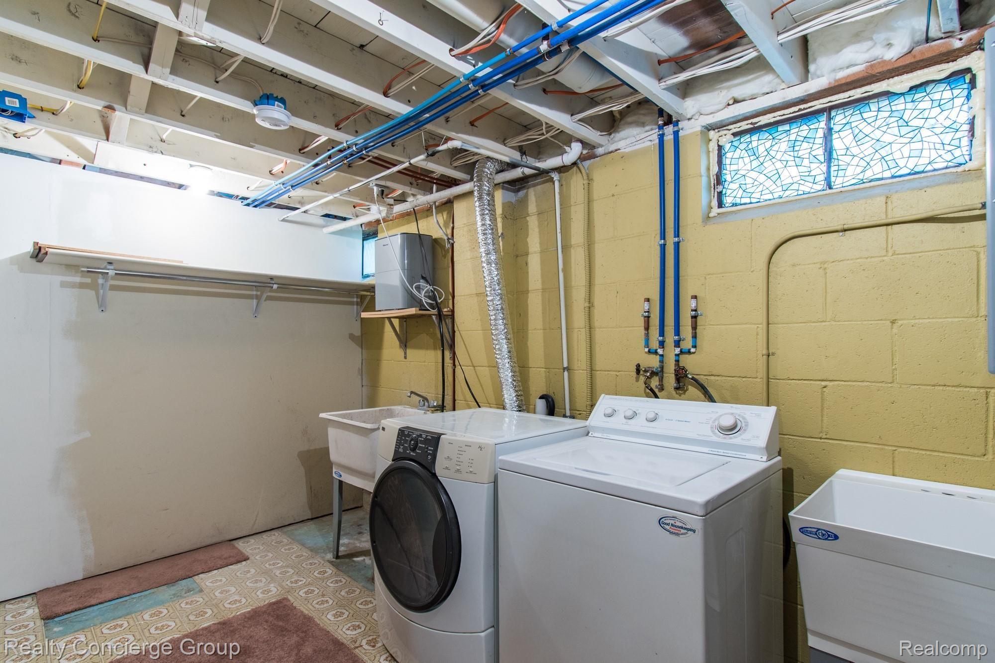 7503 Challis Road Brighton, MI 48116 - Photo 17 of 27 Laundry area includes washer & dryer
