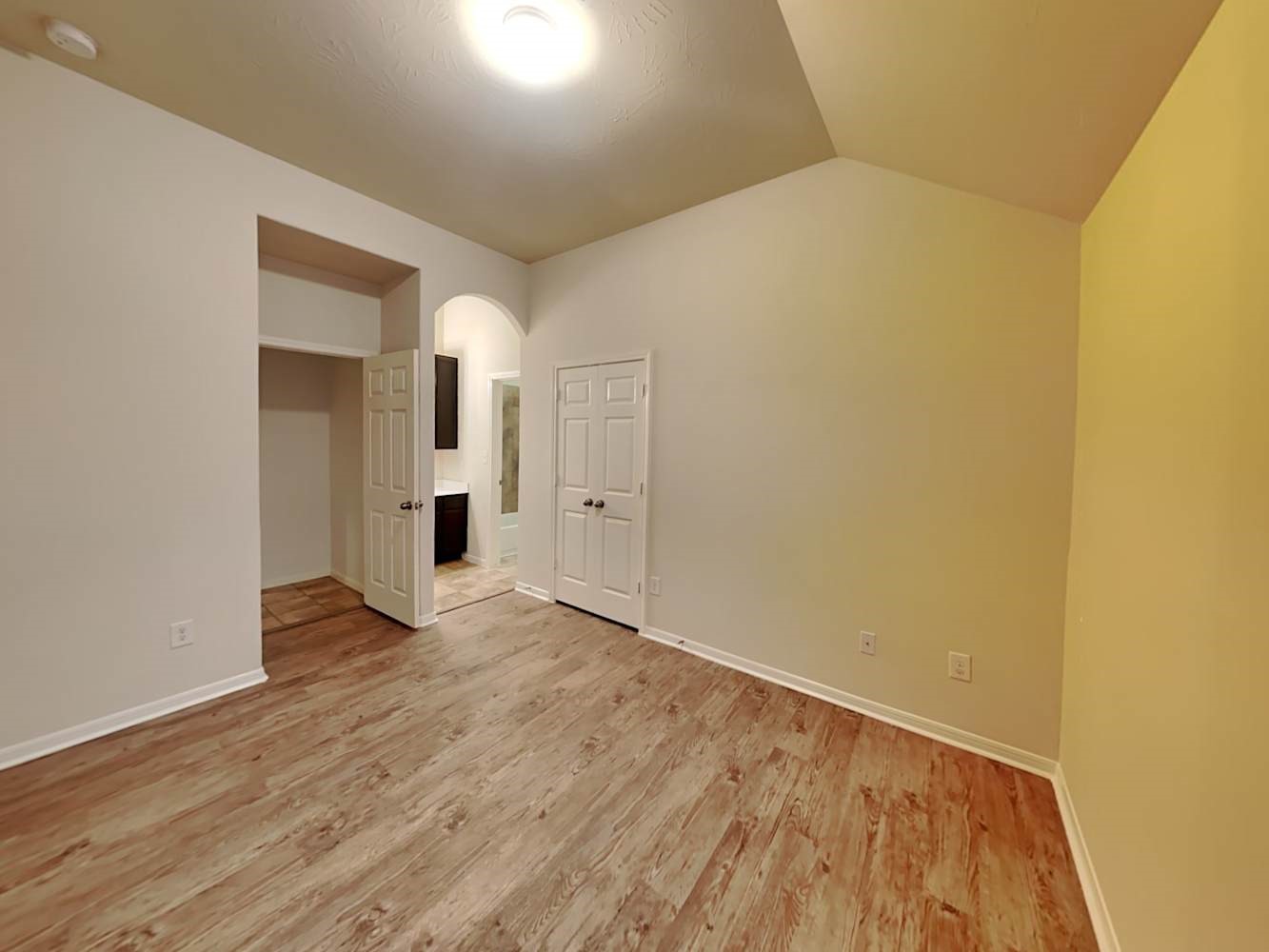 30619 Ginger Trace Drive Spring, TX 77386 - Photo 13 of 16 a view of an empty room with wooden floor and a window