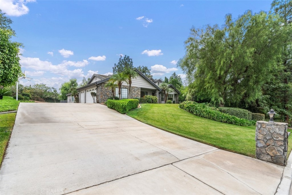1380 Basel Place Riverside, CA 92506 - Photo 1 of 1 a view of a house with a yard