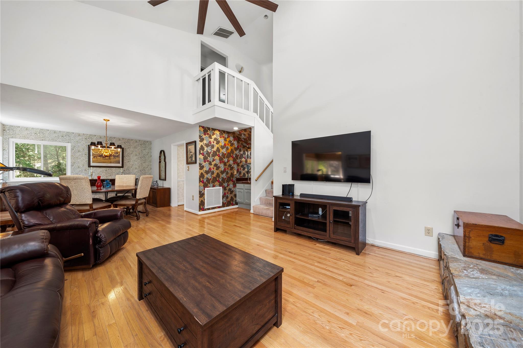8928 St Croix Lane Charlotte, NC 28277 - Photo 11 of 37 a living room with furniture and a flat screen tv