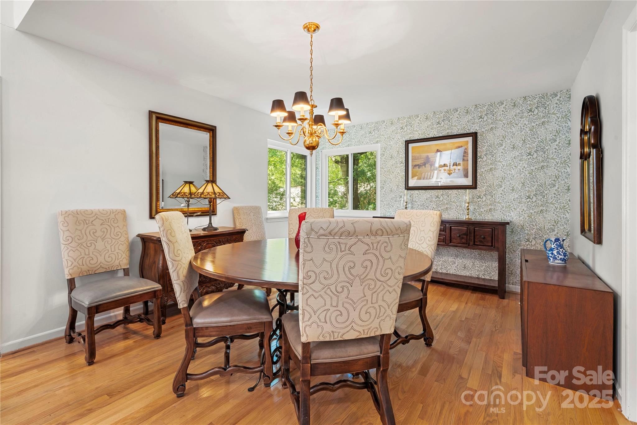 8928 St Croix Lane Charlotte, NC 28277 - Photo 12 of 37 a view of a dining room with furniture window and wooden floor