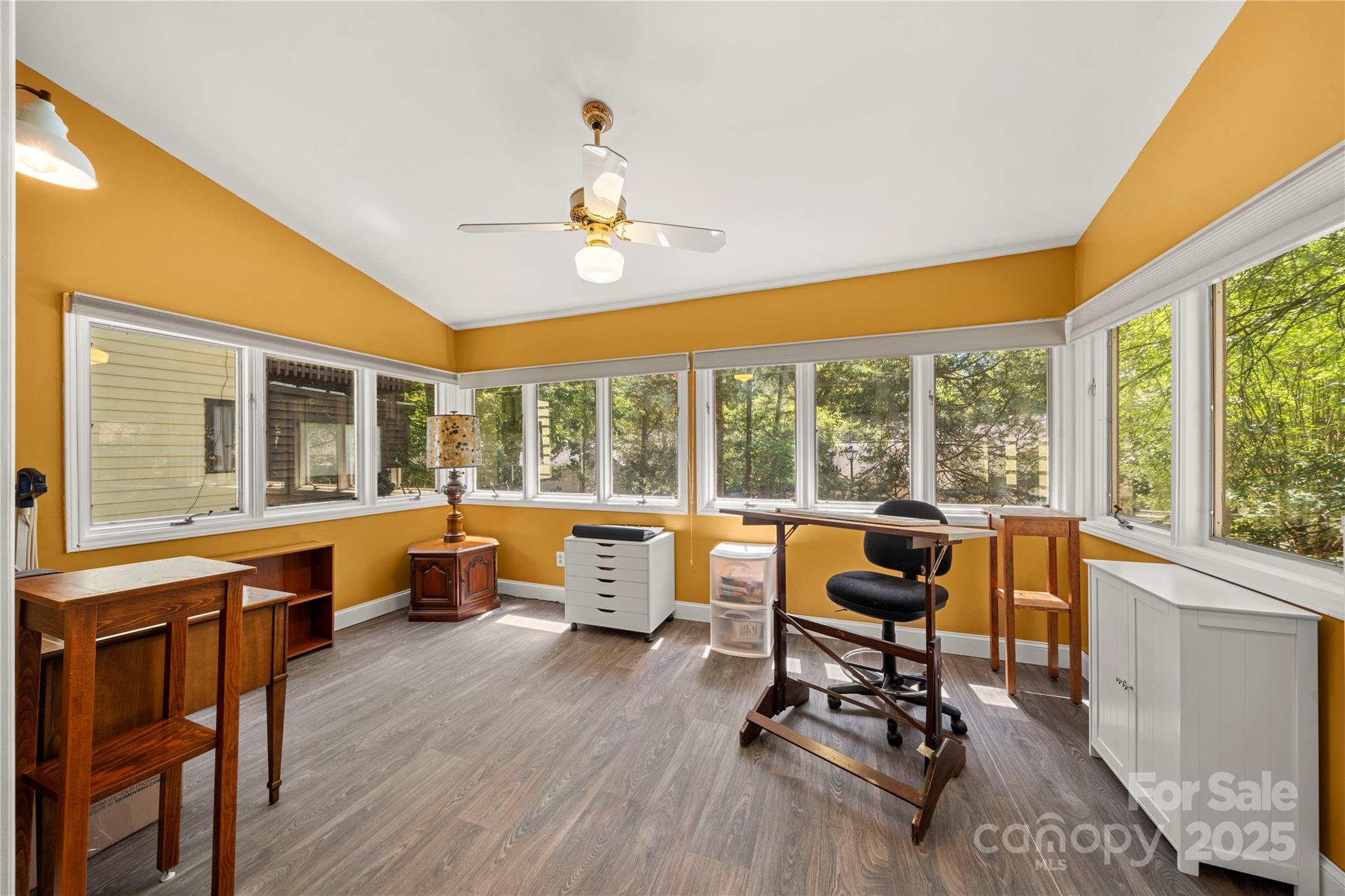 8928 St Croix Lane Charlotte, NC 28277 - Photo 19 of 37 a view of a workspace with furniture and a window