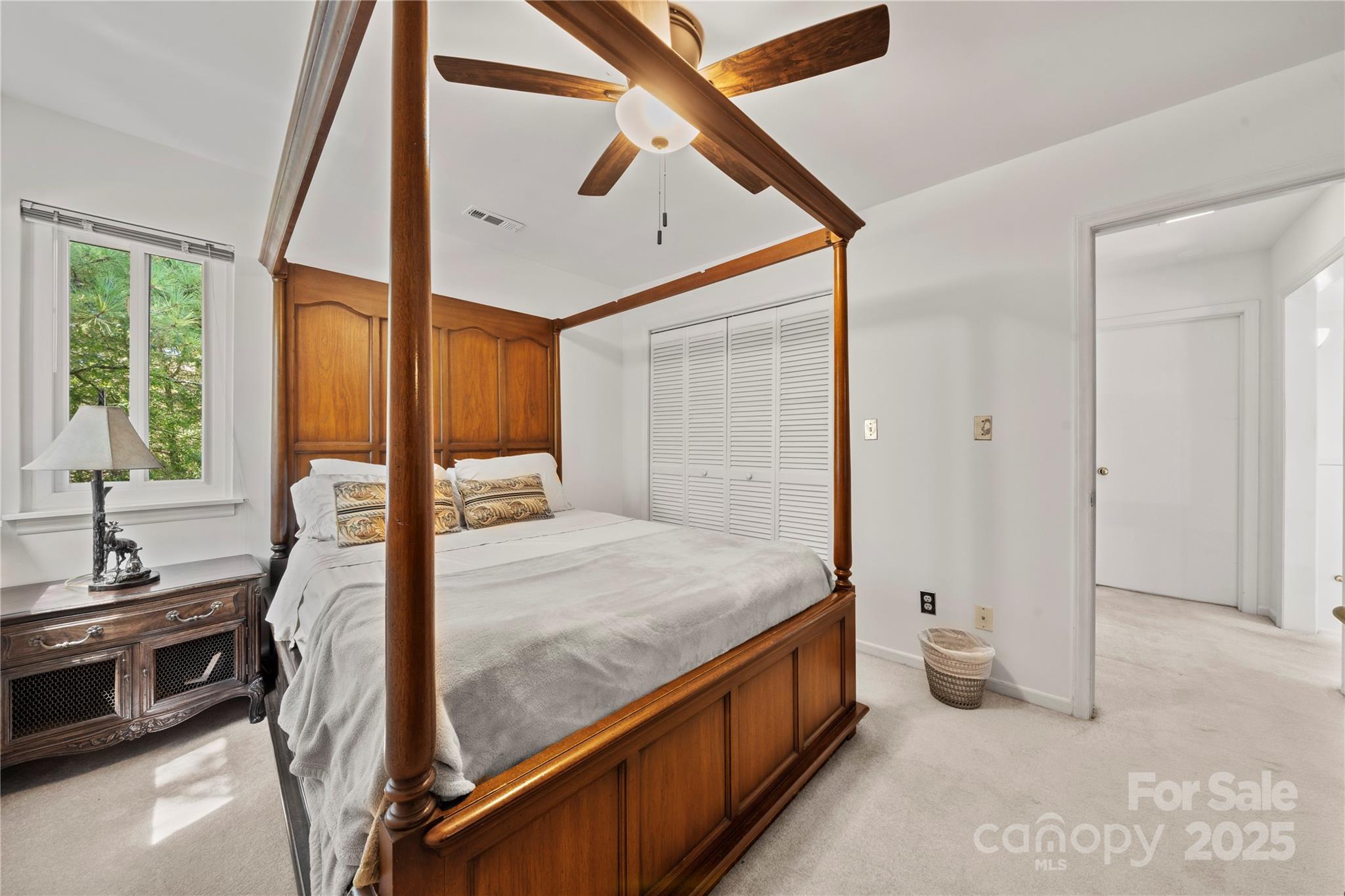 8928 St Croix Lane Charlotte, NC 28277 - Photo 20 of 37 a bedroom with a bed and a large window