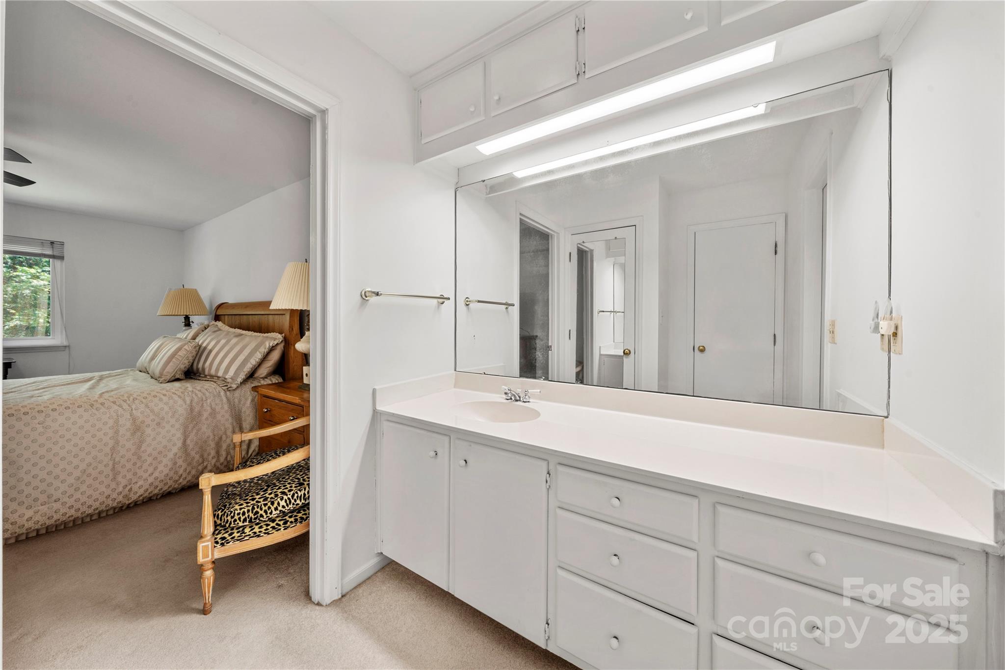 8928 St Croix Lane Charlotte, NC 28277 - Photo 28 of 37 a bedroom with a bed and a cabinets