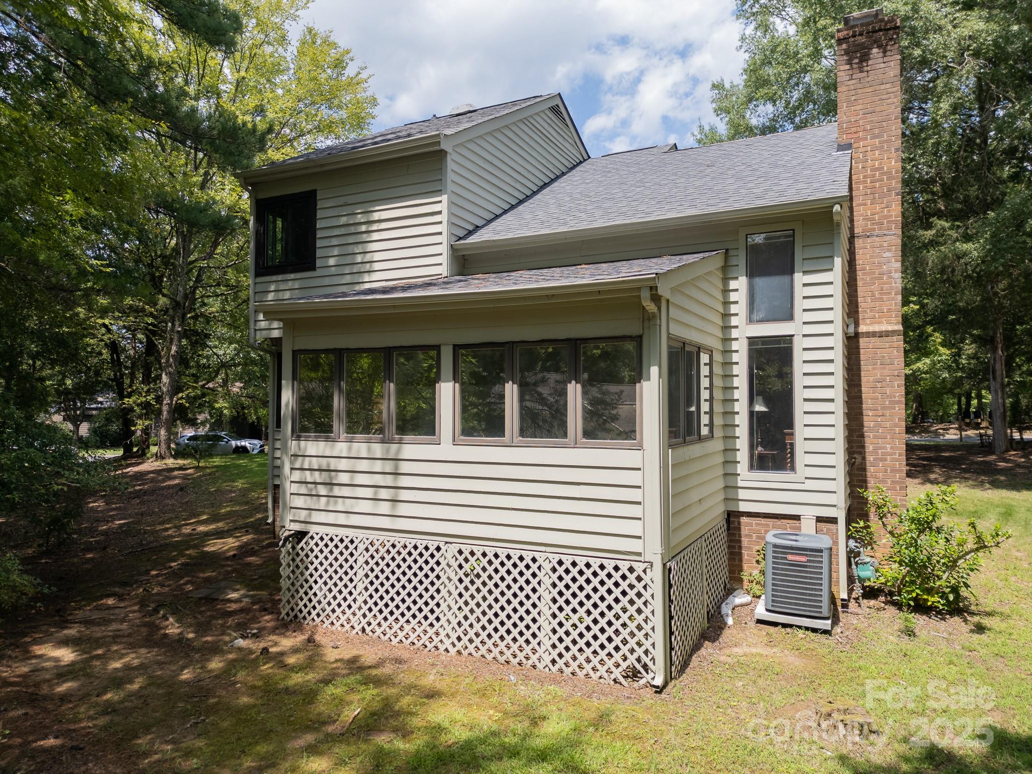 8928 St Croix Lane Charlotte, NC 28277 - Photo 34 of 37 a front view of a house with a yard
