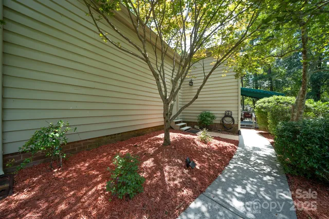 a backyard of a house with lots of green space