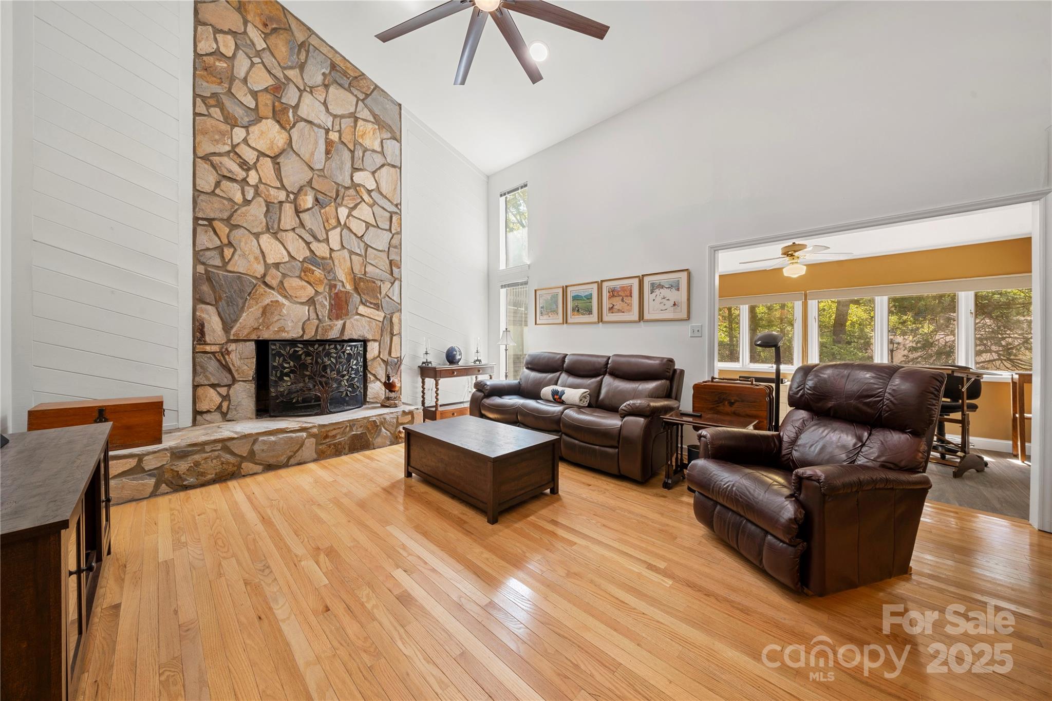 8928 St Croix Lane Charlotte, NC 28277 - Photo 8 of 37 a living room with furniture wooden floor and a fireplace