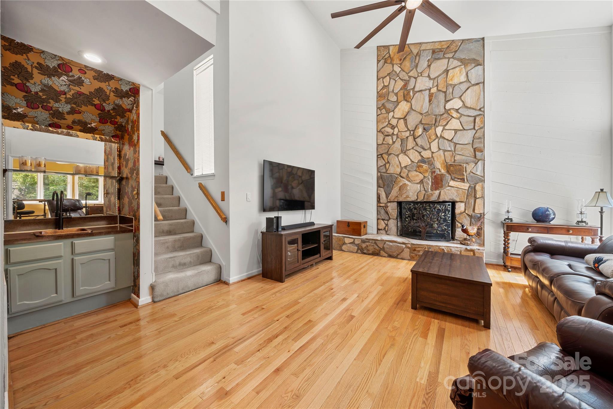 8928 St Croix Lane Charlotte, NC 28277 - Photo 10 of 37 a living room with furniture and a fireplace