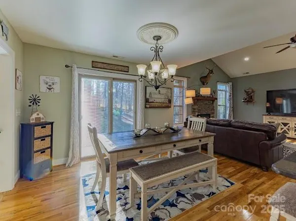 a room with furniture and a potted plant