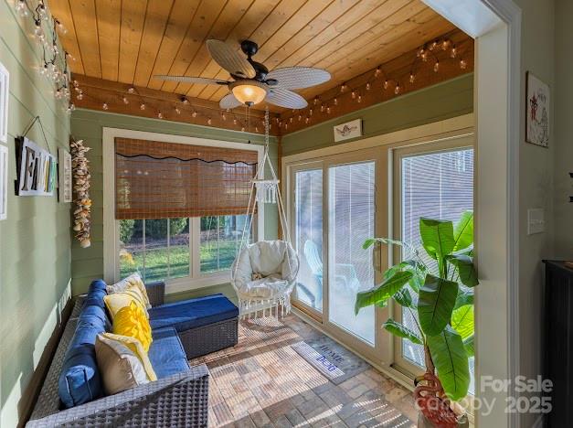 117 Maplewood Court Hudson, NC 28638 - Photo 16 of 48 a room with furniture and a potted plant