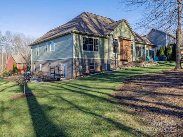 117 Maplewood Court Hudson, NC 28638 - Photo 2 of 48 a front view of a house with a yard table and chairs
