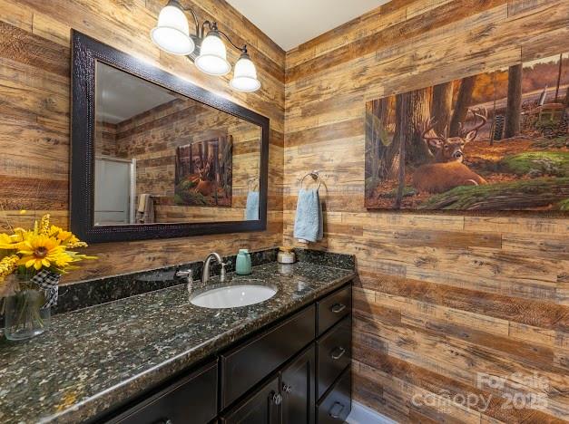 117 Maplewood Court Hudson, NC 28638 - Photo 23 of 48 a bathroom with a granite countertop sink and a mirror