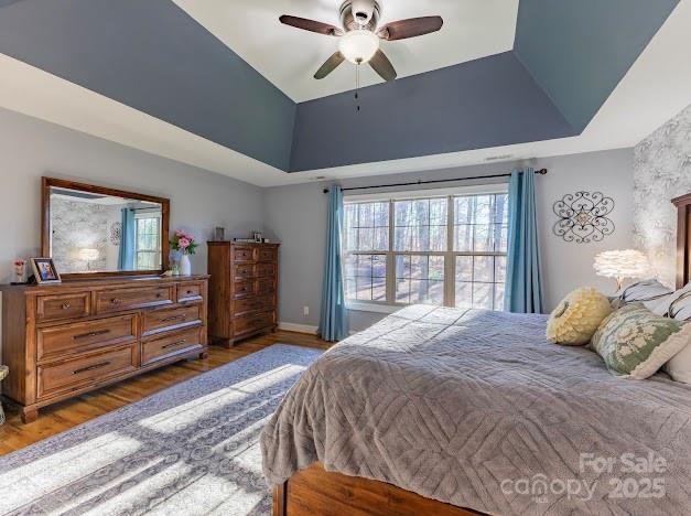 117 Maplewood Court Hudson, NC 28638 - Photo 30 of 48 a bedroom with a bed and wooden floor