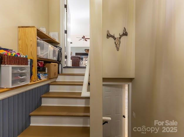 117 Maplewood Court Hudson, NC 28638 - Photo 38 of 48 a view of staircase with lots of frames on wall