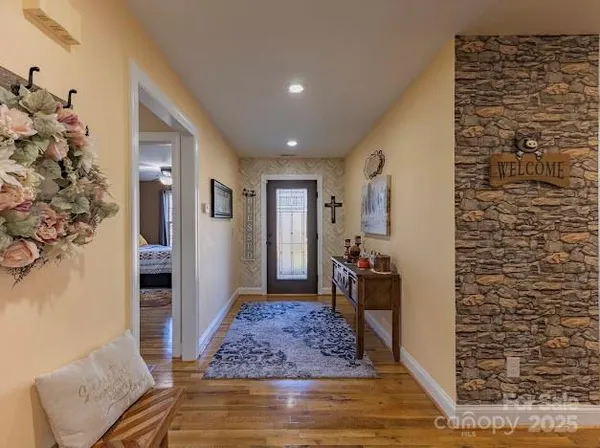 a view of a hallway view with staircase