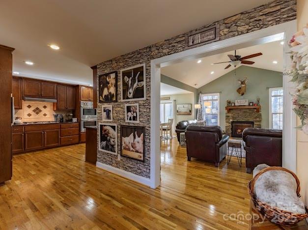 117 Maplewood Court Hudson, NC 28638 - Photo 8 of 48 a living room with fireplace furniture and a flat screen tv