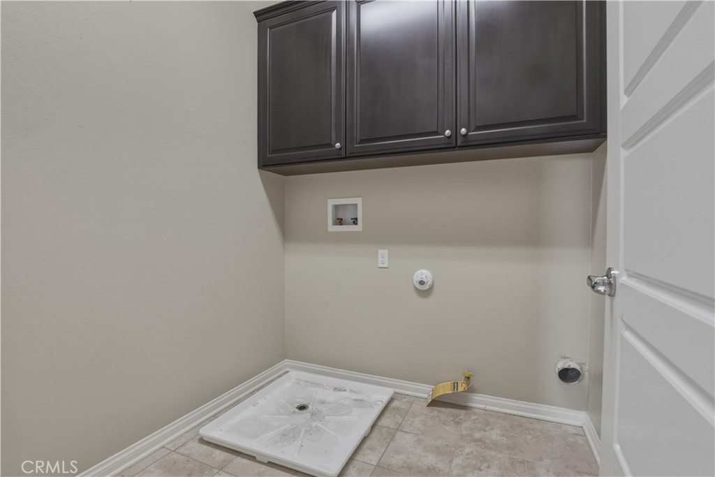 20292 Paseo Almendra Porter Ranch, CA 91326 - Photo 36 of 44 Upstairs Laundry Area