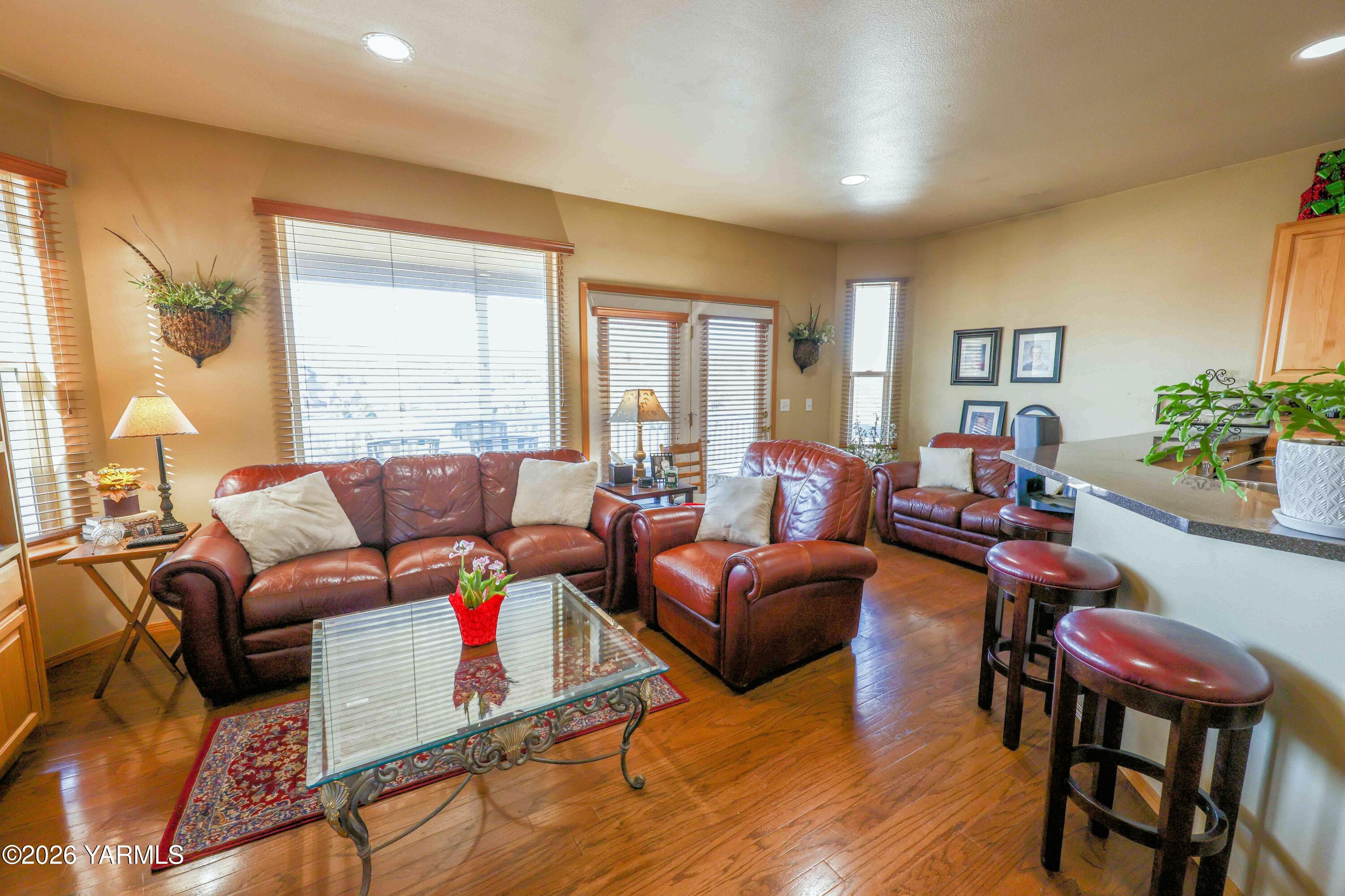 224 Heysman Road Selah, WA 98942 - Photo 14 of 28 a living room with furniture and a large window