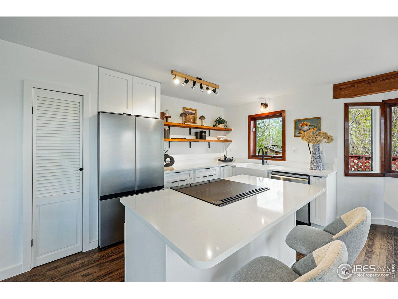 4731 Jay Road Boulder, CO 80301 - Photo 18 of 50 a kitchen with a refrigerator and a sink