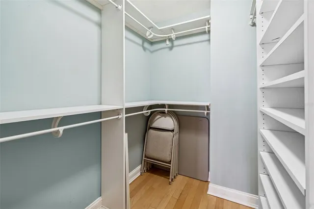 a bathroom with a sink vanity mirror and toilet