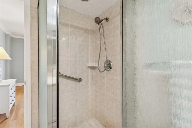 a view of a swimming pool with a patio and couches