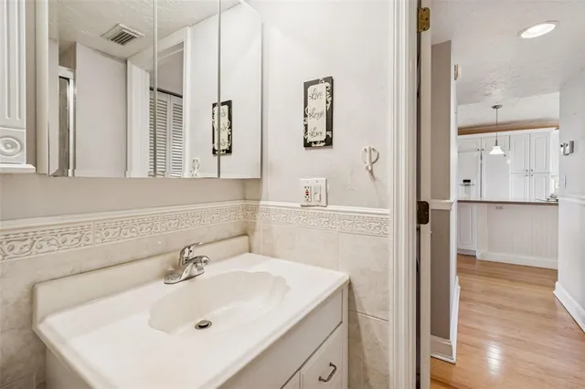 an aerial view of a house with a lake view