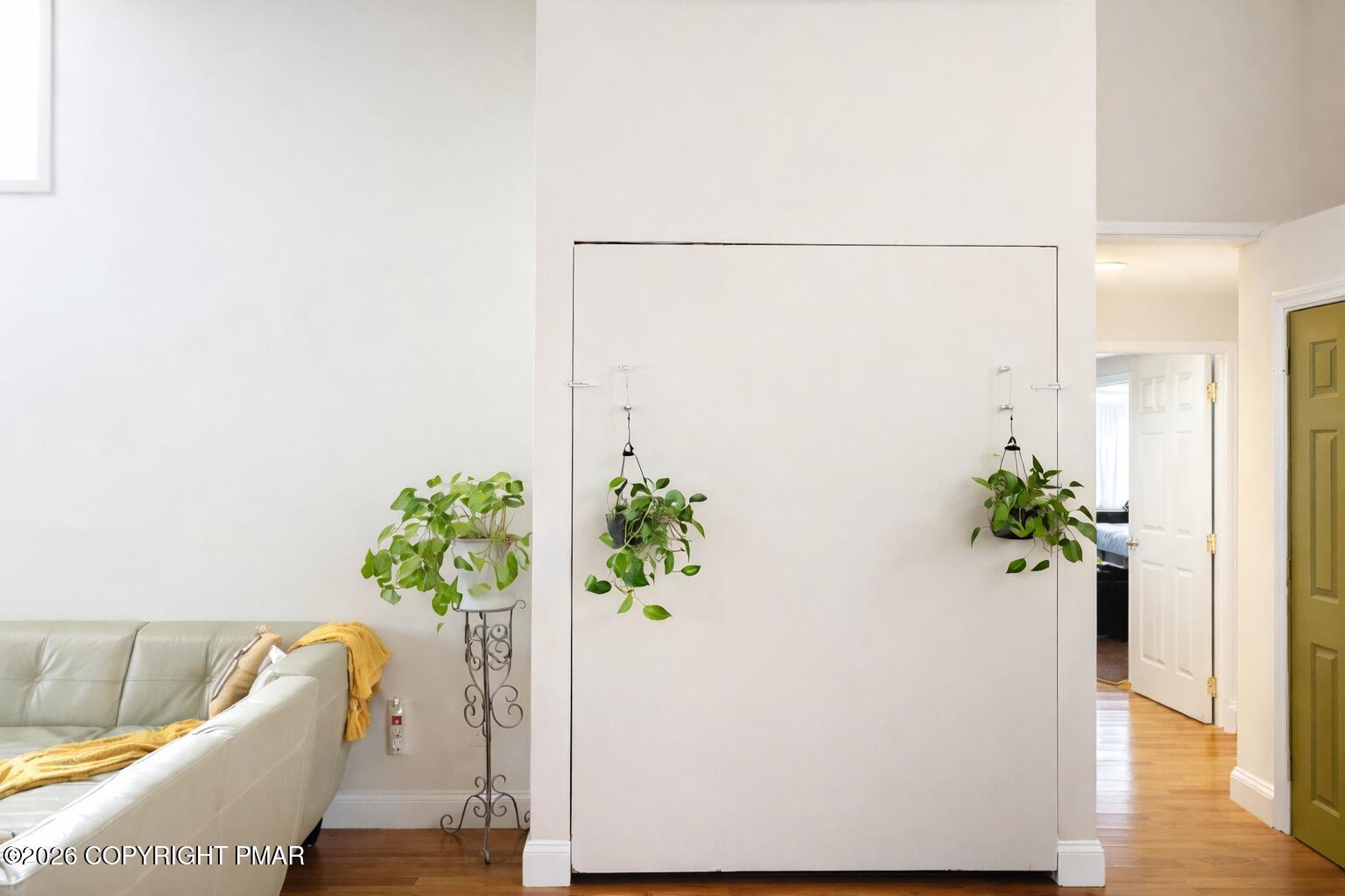 113 Condor Drive, Unit 30 Tamiment, PA 18371 - Photo 7 of 20 a white vase with white and yellow flowers