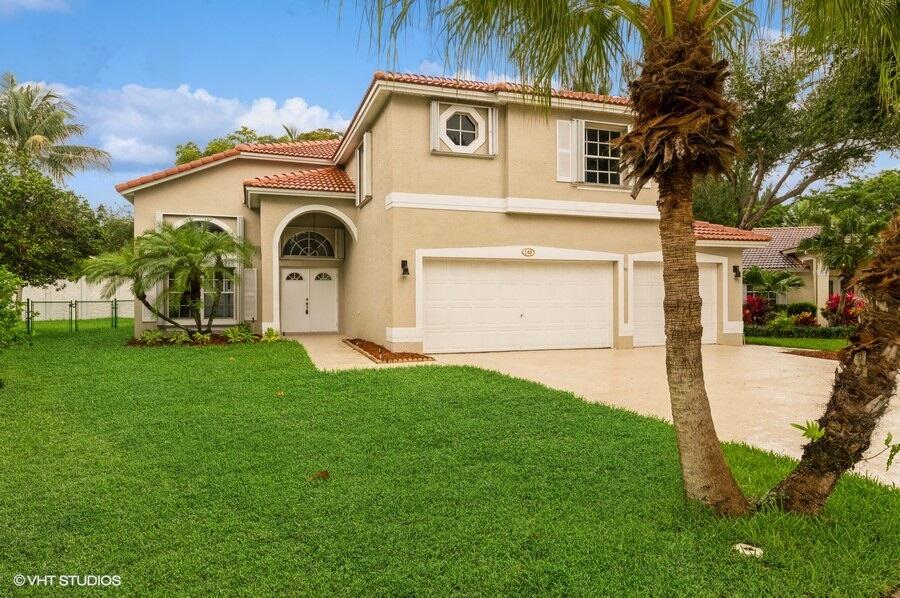 140 West Lee Road Delray Beach, FL 33445 - Photo 1 of 37 Front