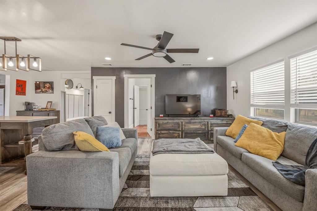 412 North Kirk Street Hico, TX 76457 - Photo 18 of 25 a living room with furniture and a flat screen tv