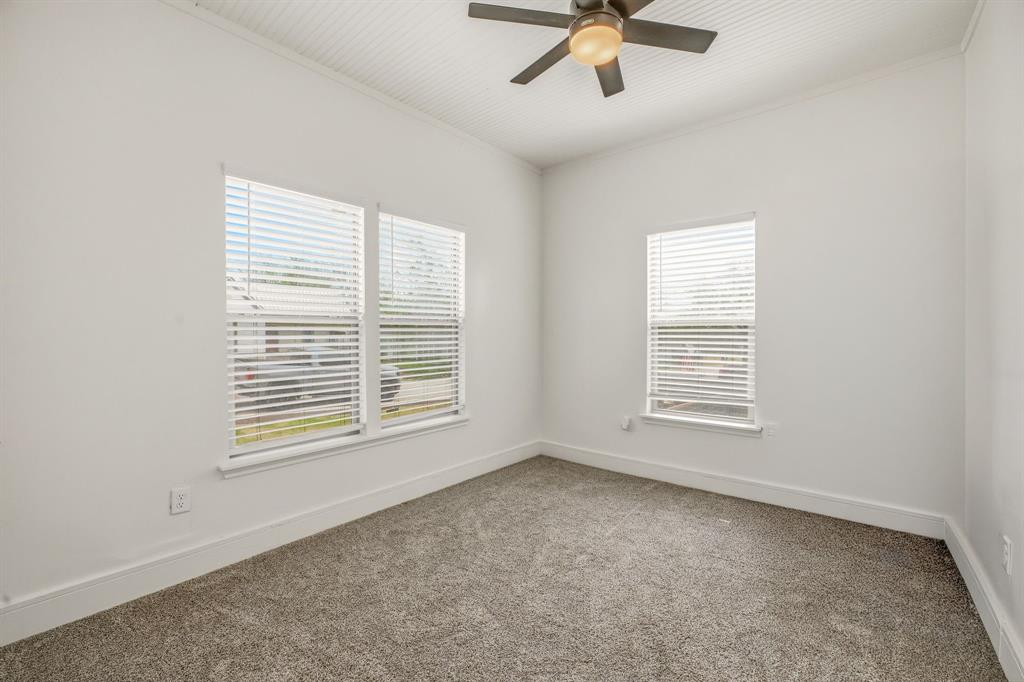 412 North Kirk Street Hico, TX 76457 - Photo 6 of 25 a view of an empty room with a window