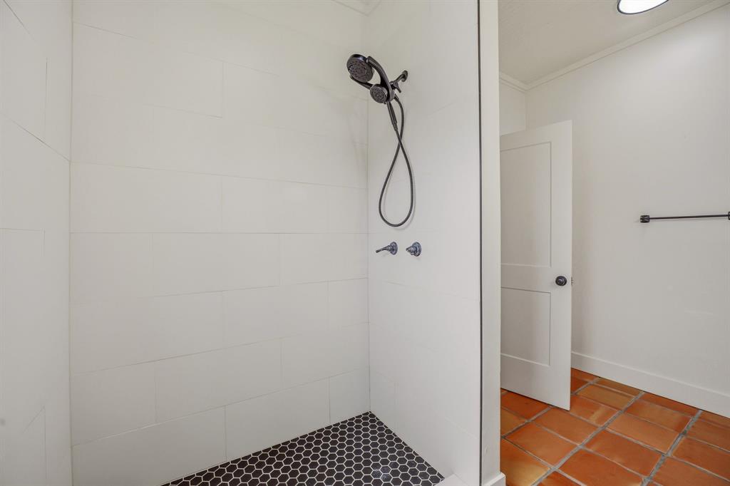 412 North Kirk Street Hico, TX 76457 - Photo 9 of 25 a bathroom with a shower