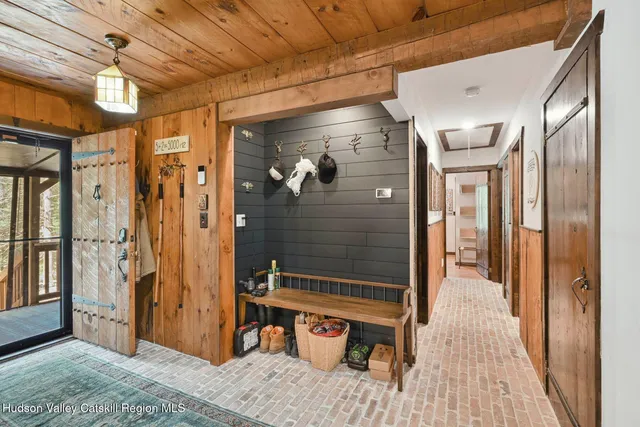 swimming pool view with a seating space
