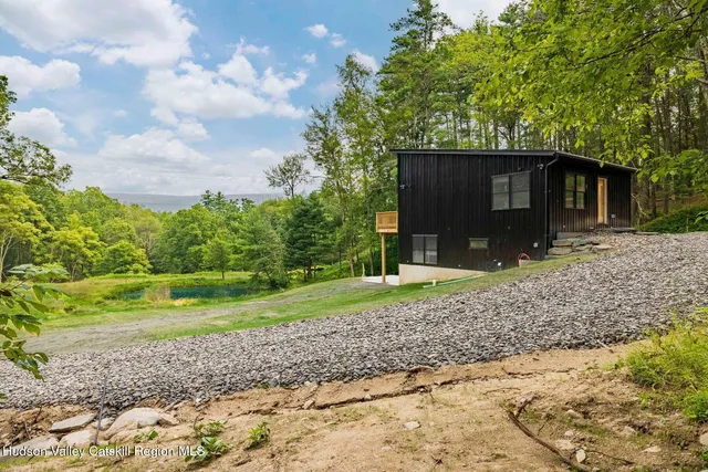 a house view with a garden space