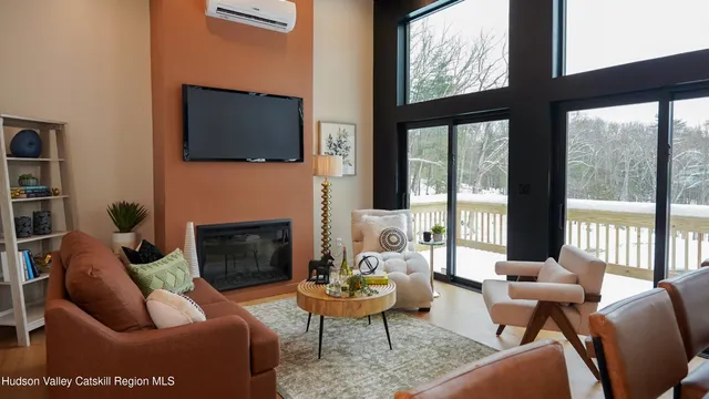 a view of a big yard with plants and large trees