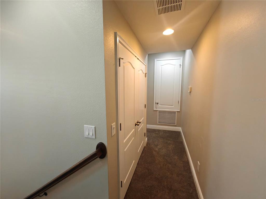 8075 Schelling Street Orlando, FL 32827 - Photo 20 of 51 a view of a hallway